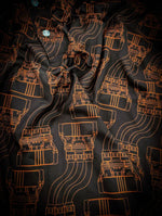 black polo shirt featuring an orange high voltage power connector image printed all over.
