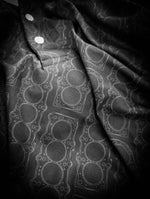 black polo shirt featuring a clean 2JZ engine head gasket design printed all over.